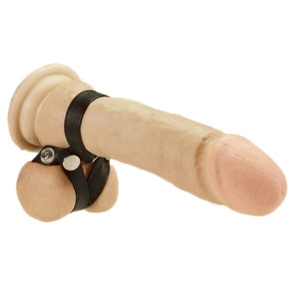 Correa de cuero para el pene con botones a presión